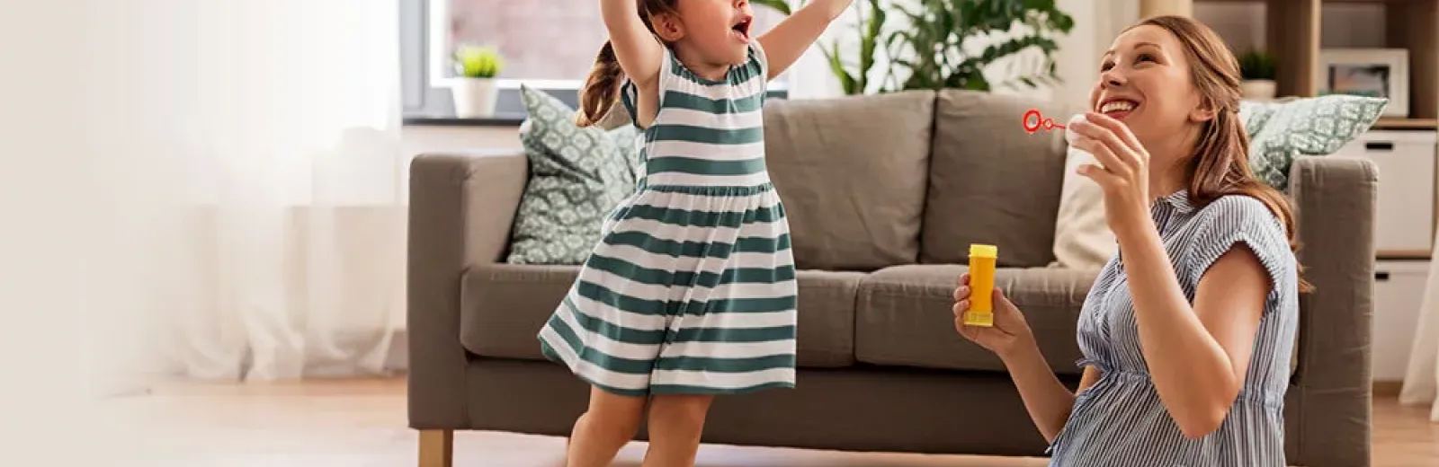 Woman and daughter playing