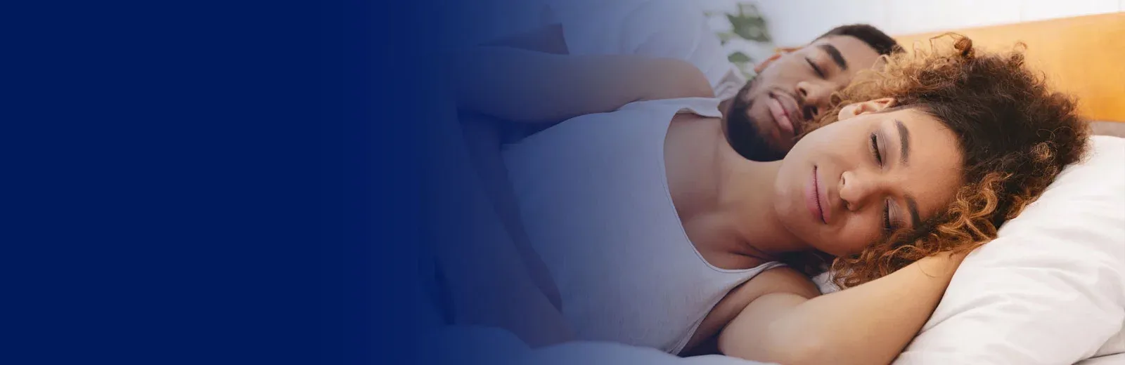 Couple sleeping peacefully in bug free bed