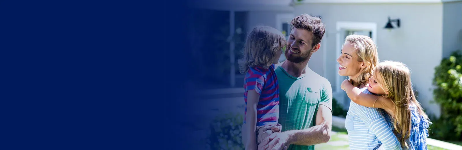 Happy family outside mosquito free yard